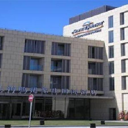 Howard Johnson Plaza Lingang Shanghai Хайнань Экстерьер фото