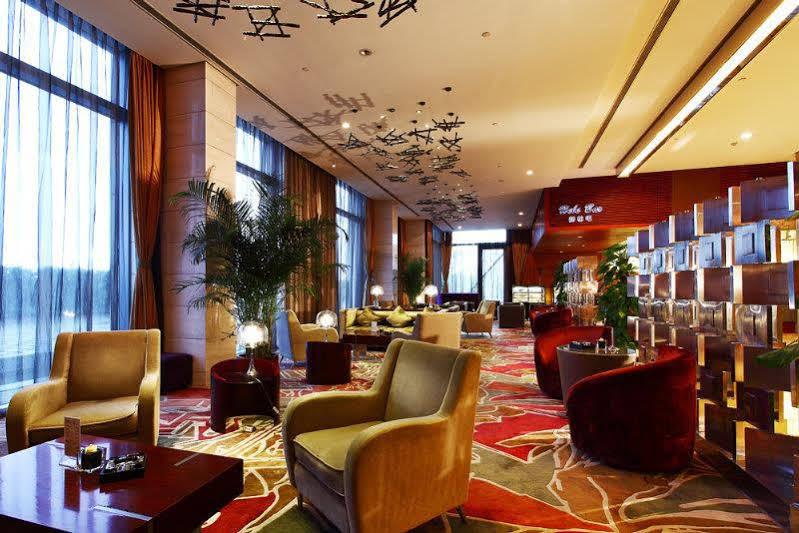 Howard Johnson Plaza Lingang Shanghai Хайнань Экстерьер фото
