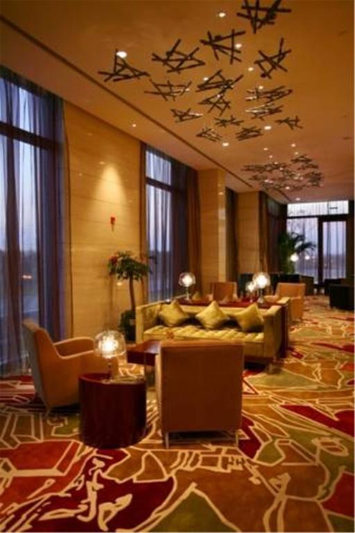 Howard Johnson Plaza Lingang Shanghai Хайнань Экстерьер фото